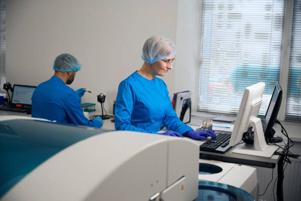 istock Man and woman laboratory assistants use modern computers at work 2037986227