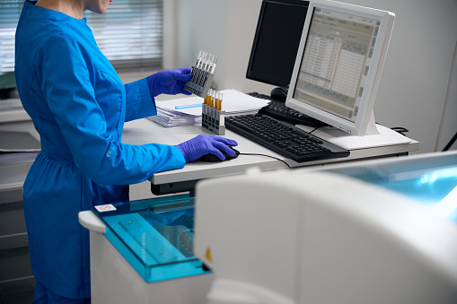 Specialist enters urine sample data into the database, the samples are labeled