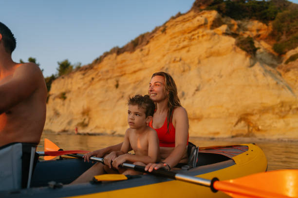 istock Family paddling on the ocean 2038097650