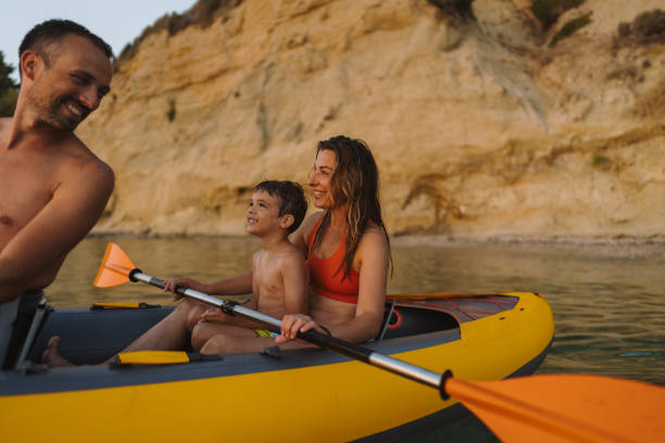 istock Family paddling on the ocean 2038098203