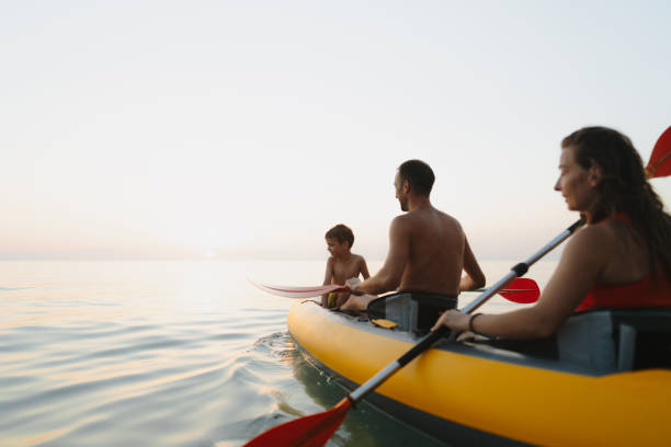 istock Family paddling on the ocean 2038098724