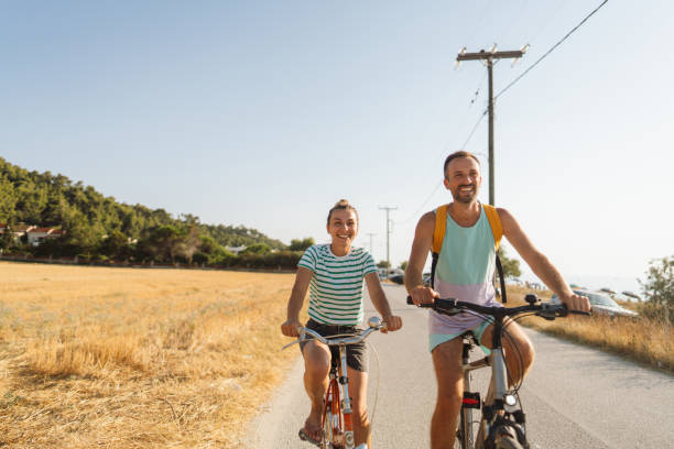 istock Loving couple exploring coastline on bicycles 2038103683