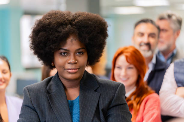 Confident woman leading a team discussion.
