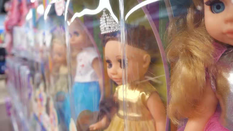 Dolls close-up. Dolls on a store shelf.