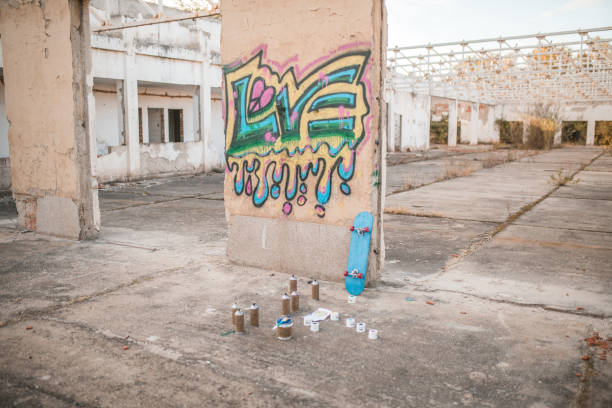 Colorful graffiti drawn on the wall of an abandoned building, during the day