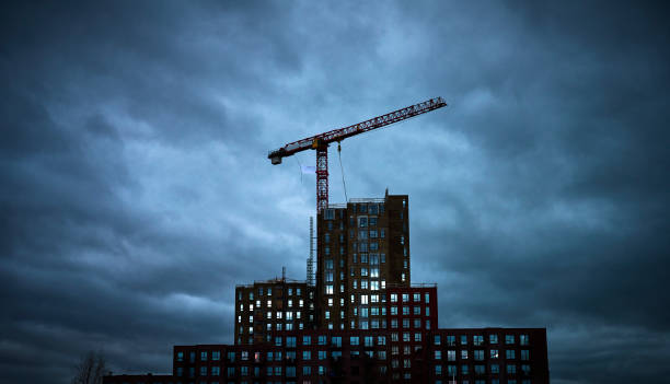 City development in Odense on Funen. Construction crane over new buildings