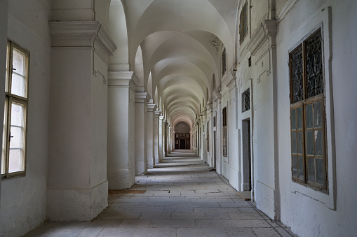 Prague, Czech Republic — June 17, 2023 - Long hallway of Invalidovna — baroque building for war veterans built in 1731—1737