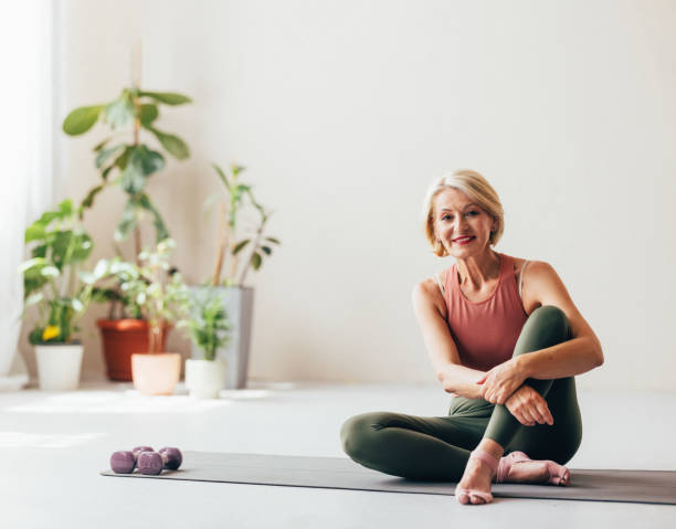 istock Active Senior Woman Enjoying Home Workout Session Indoor 2038149031