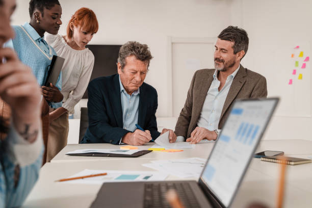 Signing a Business Contract with a Diverse Team