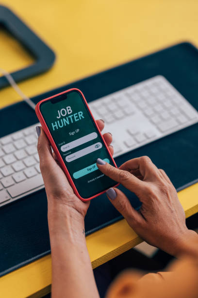 istock Person Using a Job Hunter App on Mobile Phone for Employment Search 2038158017