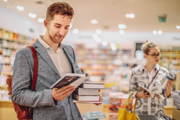 istock Young couple shopping books 2038165853