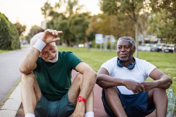 istock Happy and mature people with smile, laughing and joy outdoors for exercise, workout and training 2038166373