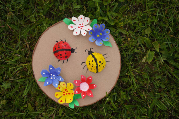 istock DIY flowers and lady bug from recycling egg boxes. Zero waste concept. 2038166445