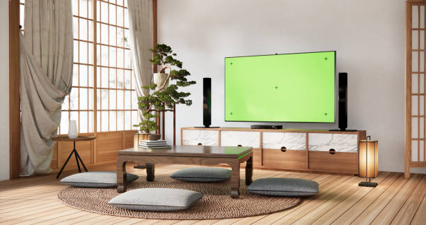 istock Smart Tv Mockup with blank green screen hanging in modern white empty room interior minimal designs. 2038174705