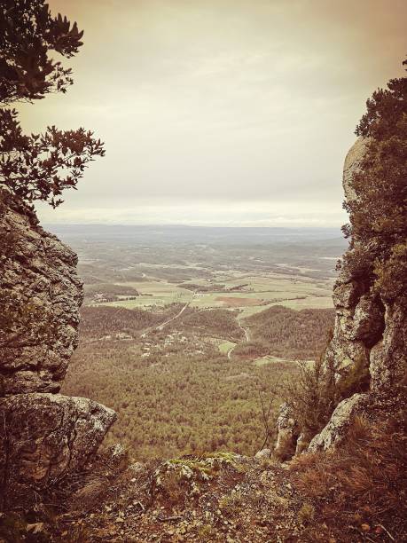 istock Rural landscape in the background framed by two rocks 2038207033
