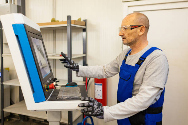 istock Worker Operating Laser Cutter in Factory s 2038213975