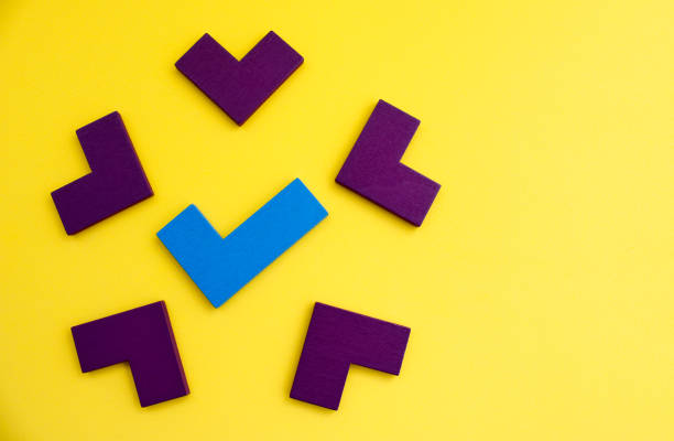 istock Arrows surrounding check mark, wooden figures 2038217233