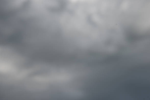 The sky is cloudy and grey. The clouds are low and heavy, and the sky is overcast