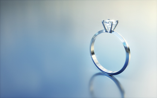 3d Render Single Stone Diamond Ring on blue gradient background (Depth Of Field)