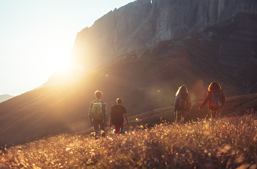 Adventures on the Dolomites: teenagers hiking