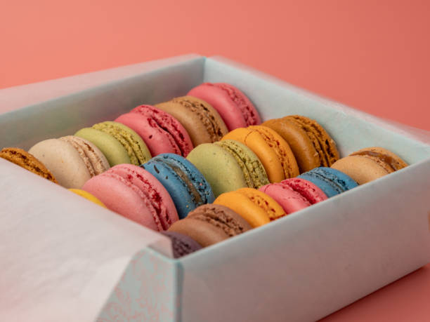 istock Packaging Colorful French macaroons on a pink background. 2038237846