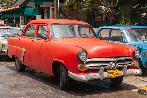 Havana, Cuba - April 12, 2010: A vintage old red Ford classic american car parked in Havana, Cuba