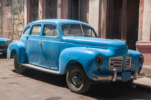 Havana, Cuba - April 12, 2010: A vintage old blue Plymouth classic american car parked in Havana, Cuba