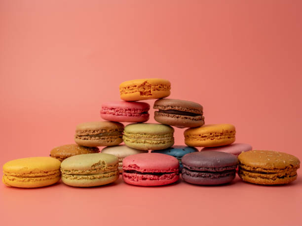 istock Colorful French macaroons on a pink background. 2038252511