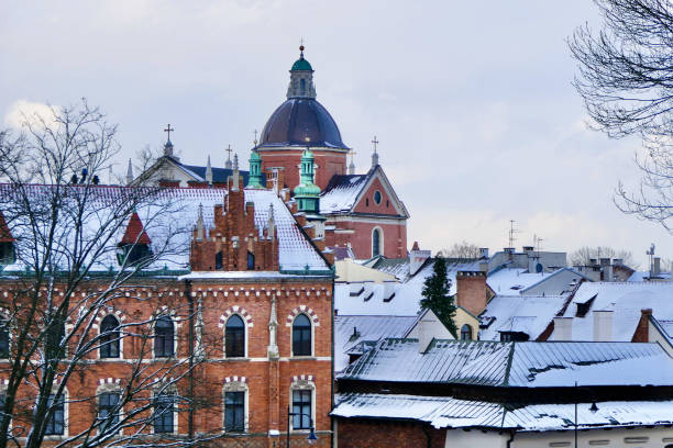 Bricks are a favored material in Old Town Krakow with decorative plaster work around the windows, as in this beautiful place of worship.