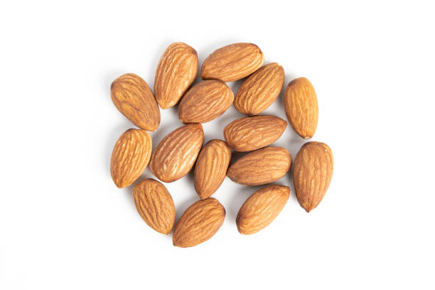 istock Fresh healthy almond nuts on white background. 2038270041