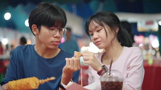 istock Enjoying street food. 2038295990