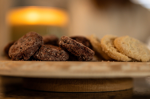 Plate of cookies with candle behind
