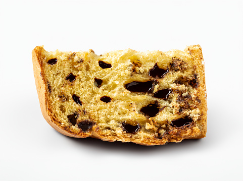 A chocottone, chocolate panettone slice isolated on white background