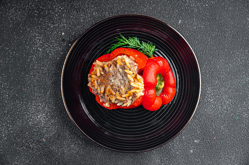 stuffed pepper meat and rice filling fresh food tasty healthy eating cooking appetizer meal food snack on the table copy space food background rustic top view