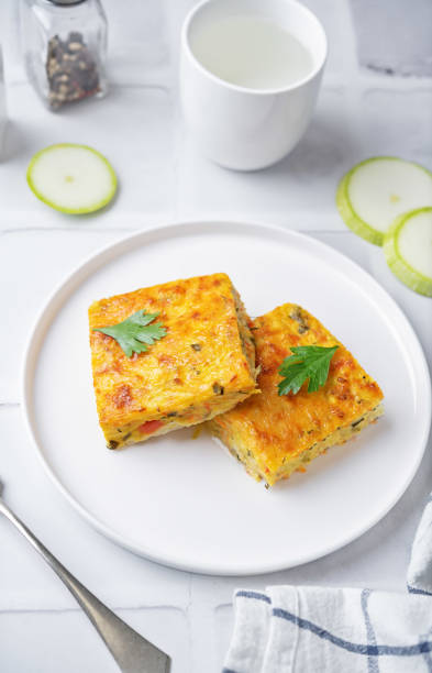 istock Zucchini carrot cheese bacon casserole slices 2038343660