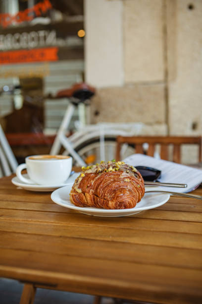 istock With croissants and coffee on the cafe's summer terrace 2038344243