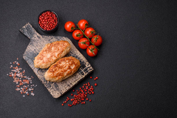 istock Delicious fresh fried minced fish cutlets with spices and herbs 2038344807