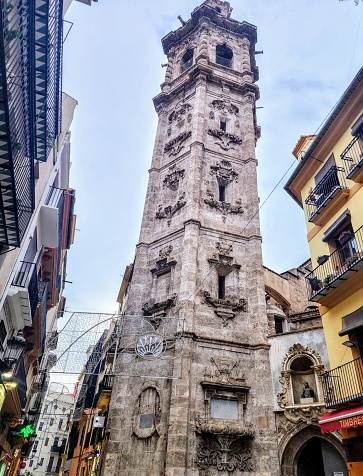 July 7, 2023,  Valencia (Spain). Belltower of Santa Catalina church is a Gothic-style, Roman Catholic church located in the city of Valencia, Spain at the southern end of Plaza de la Reina.