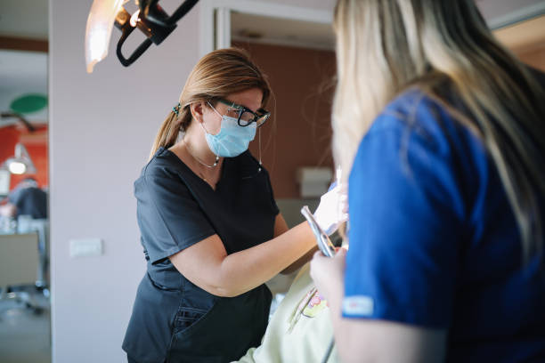 istock visiting the dental clinic 2038371443