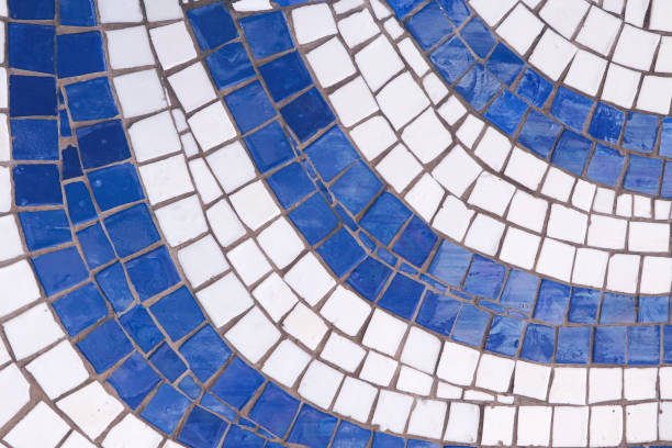 Vintage blue and white mosaic background. Mosaic pattern texture close up in retro style. Colorful polygons background.