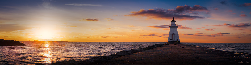Panoramic image of the lighthouses in Southampton Ontario at sunset.