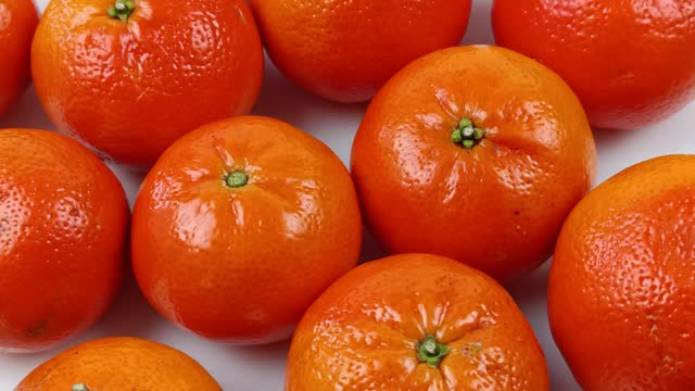 several tangerines, close-up, in a dish
