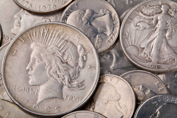 istock United States old silver coins background 2038588688