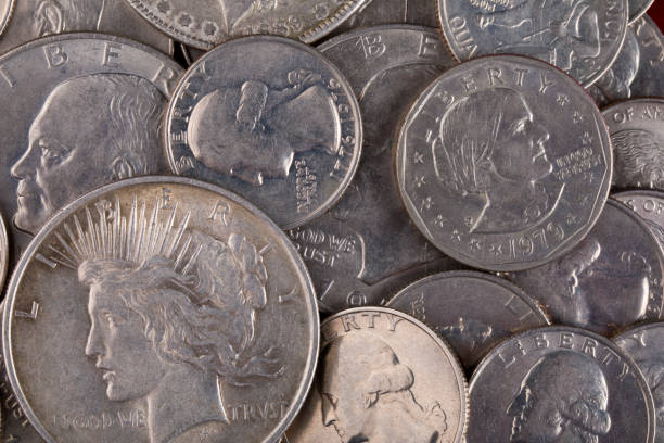 istock United States Silver coins background 2038589233