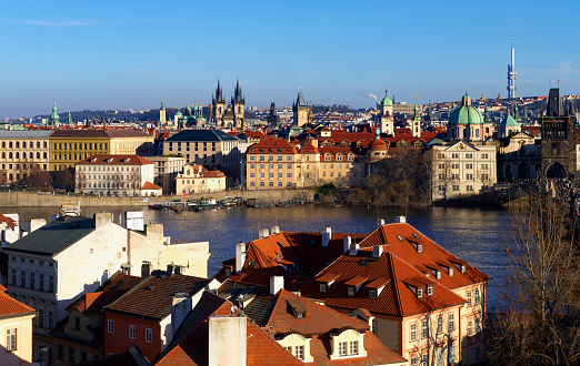 Prague, Czech Republic, January 28, 2024: View of the Old Town of the Czech capital on the Vltava River on a sunny afternoon.