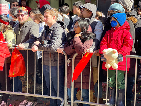 Spectators wait for the 26th Annual Chinese Lunar New Year Parade and Festival in Manhattan-Chinatown in New York City on Feb 25, 2024.