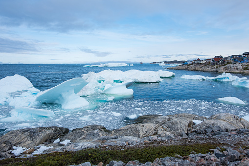 Icebergs in the waters beside Illulisat, Greenland as seen from part of the Yellow Hiking Route near the Icefjord.