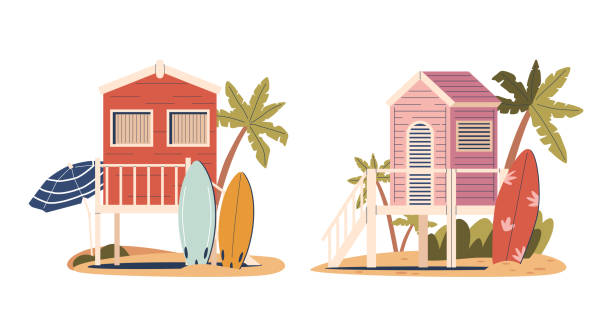 istock Beach Houses On Piles Stand Elevated Above The Sand. Summer Huts With Surfing Boards, Offering Ocean Views 2038826997