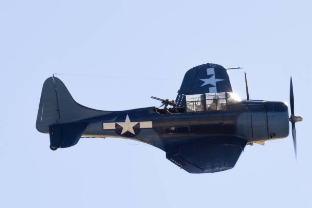 istock Side view of a WWII assault plane (SBD  Dauntless), with rear mounted machine guns 2038913528