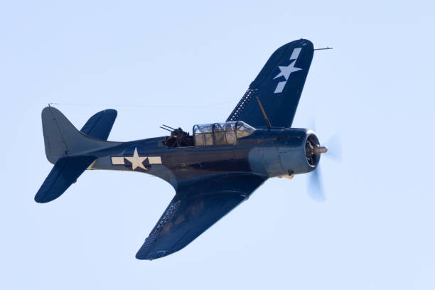 istock Side view of a WWII assault plane (SBD  Dauntless), with rear mounted machine guns 2038913531